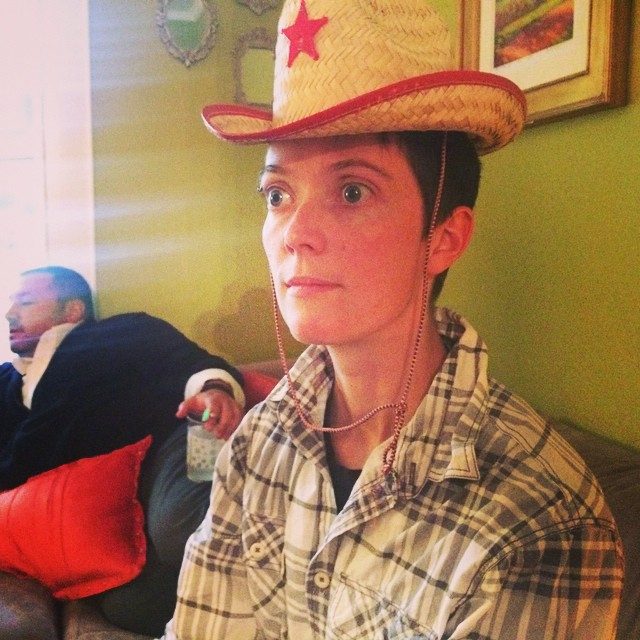 Amy in a straw cowboy hat, 2014